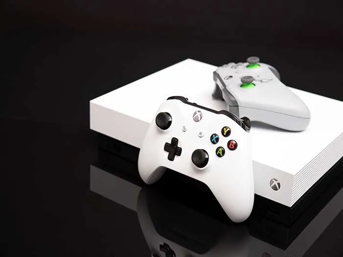White xbox one with controllers